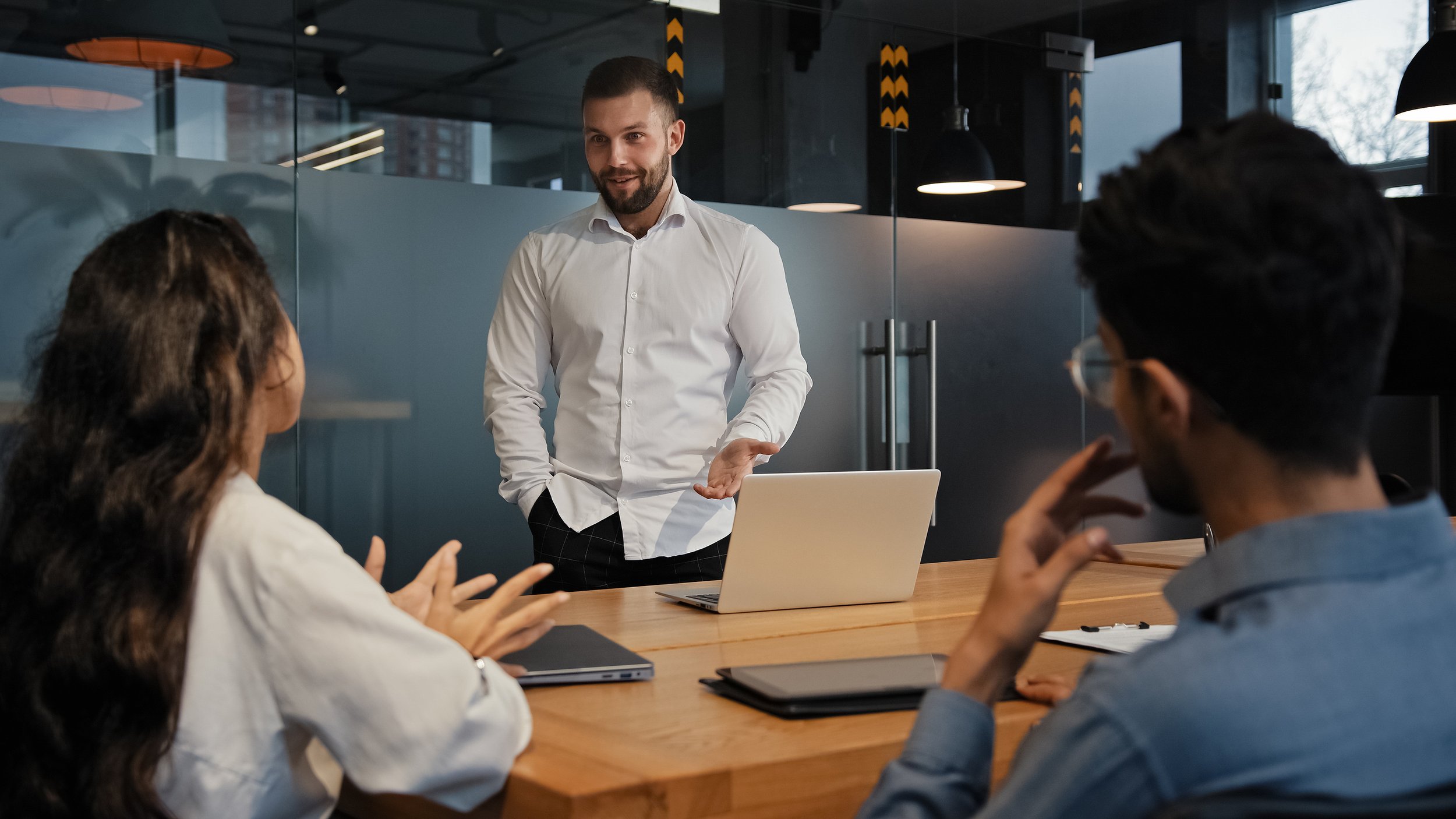 Person practicing active listening in a meeting